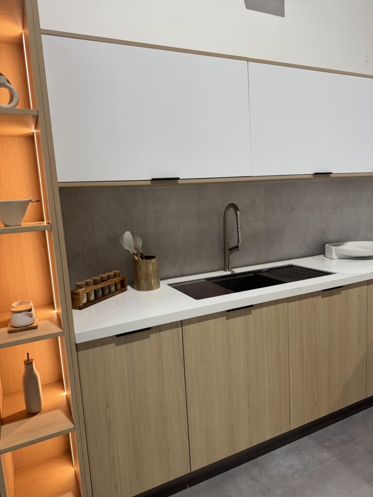 Custom cabinets, sink and illuminated shelving